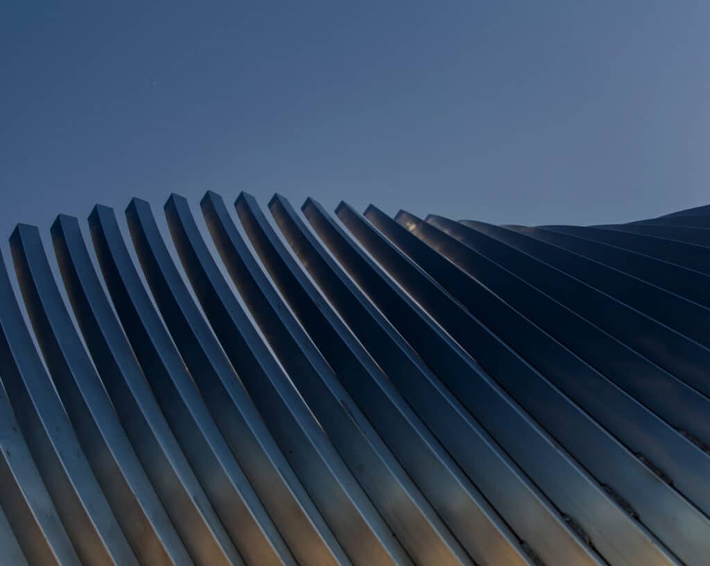 metal columns in a wave pattern