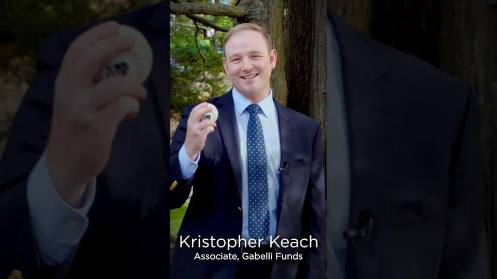 photo of kristopher keach holding a baseball
