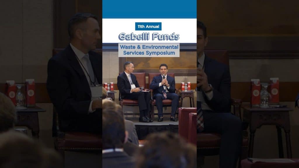 Annual Waste and environmental symposium panel image of two people speaking