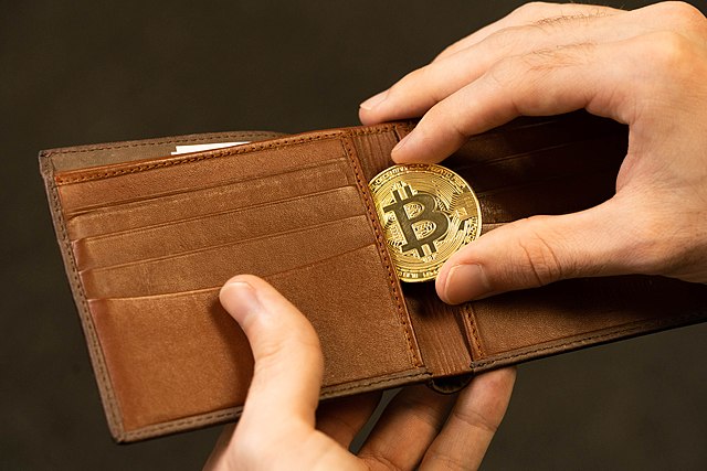 fake bitcoin going into a wallet